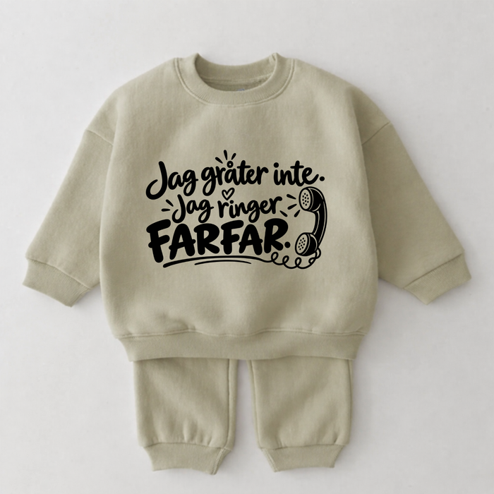 Jag gråter inte. Jag ringer Farfar. – Grön babyset