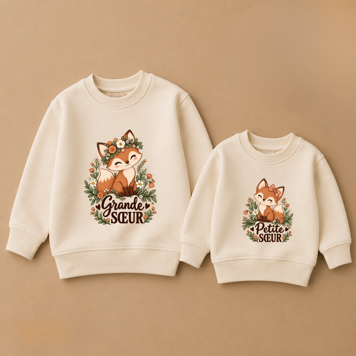 Sweaters beiges assortis avec chat-renard