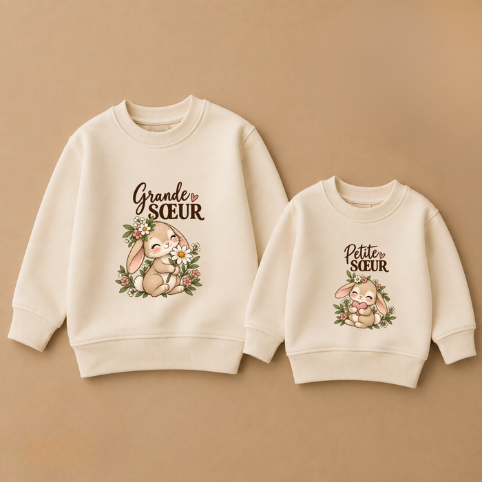 Sweaters beiges assortis avec lapin